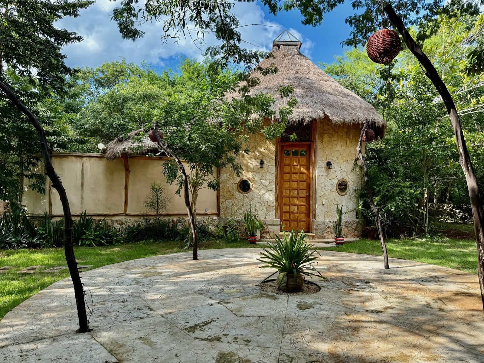 Cabin 1 — small dome cabin tucked into the Yucatán jungle.