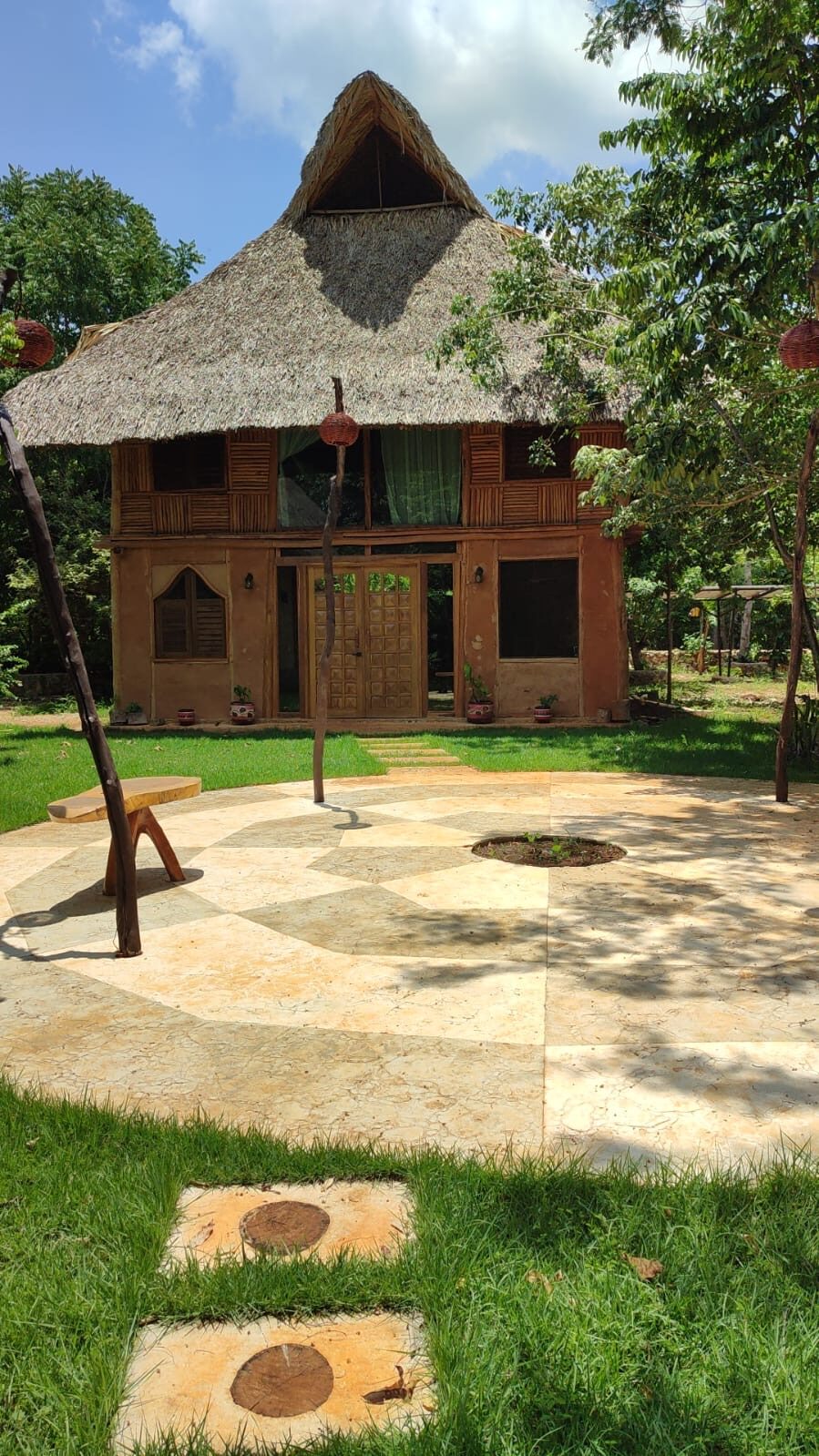 The Big Cabin — flagship two-story off-grid cabin at Hunab Ku.